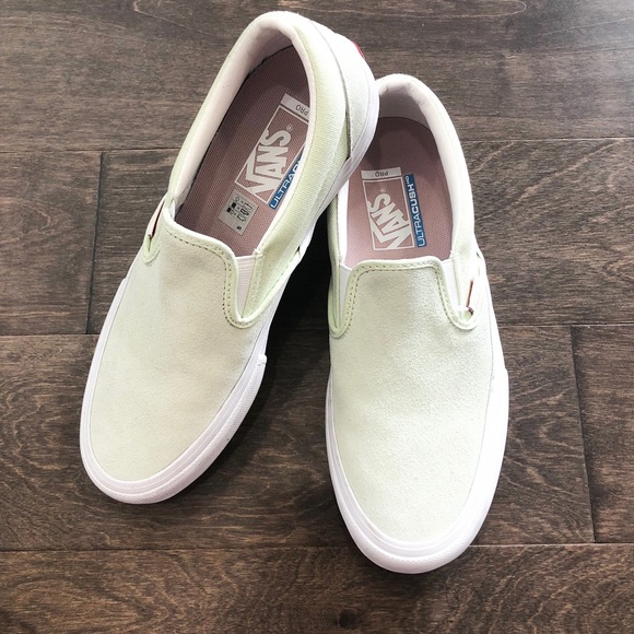 light green slip on vans